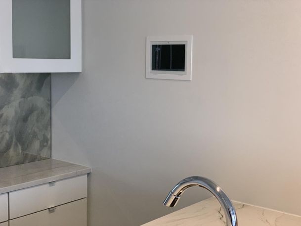 Control panel on wall in kitchen